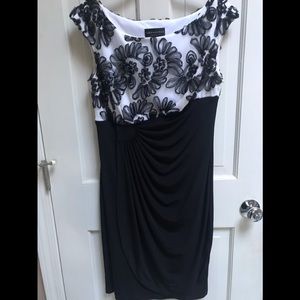 Back & white dress perfect for dressy occasion.